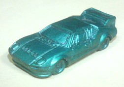 Supercar erasers (kā-keshi) — small rubber toy cars sold in Japanese gashapon machines in the late 1970s